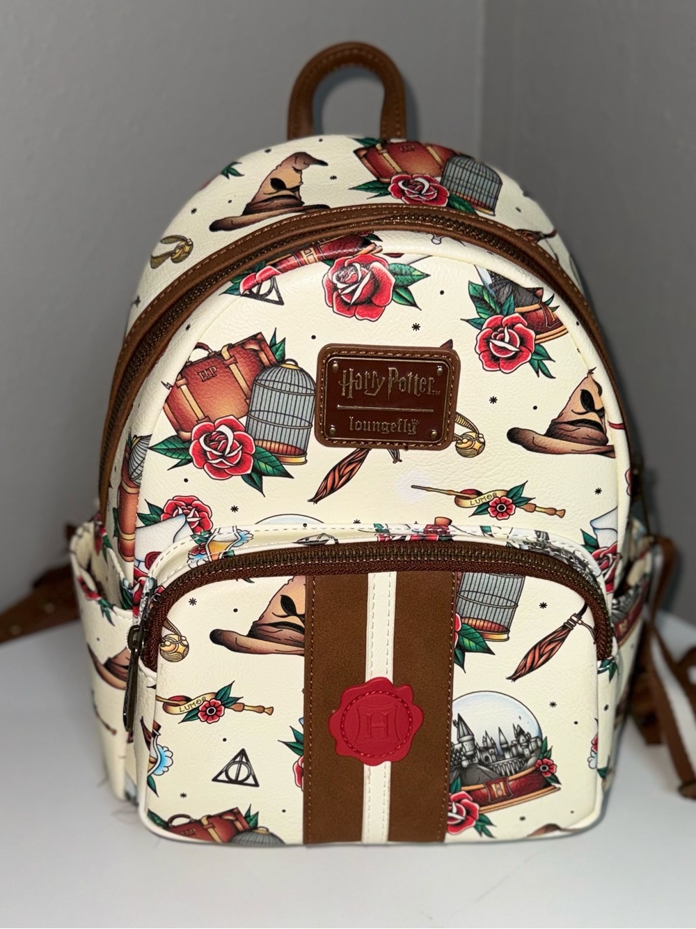 Loungefly Cream Mini Backpack with Brown Trim and Red Accents